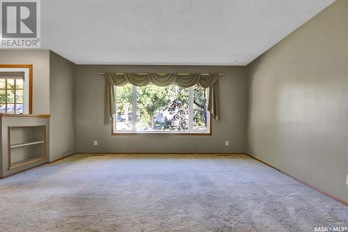 161 Mcmurchy Avenue, Regina, SK - Indoor Photo Showing Other Room With Fireplace