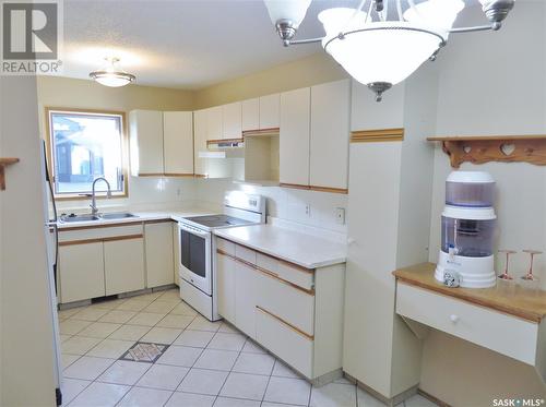 334 Landmark Place, Humboldt, SK - Indoor Photo Showing Kitchen With Double Sink