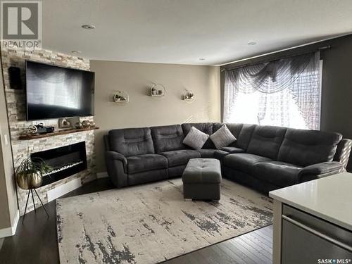 345 Bassett Road, Martensville, SK - Indoor Photo Showing Living Room With Fireplace