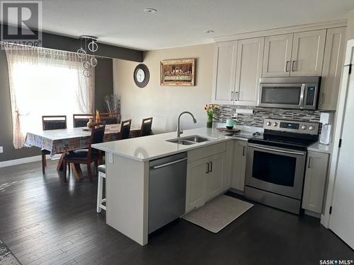 345 Bassett Road, Martensville, SK - Indoor Photo Showing Kitchen With Double Sink