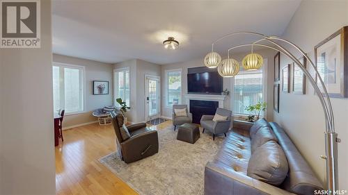 3360 Windsor Park Crescent, Regina, SK - Indoor Photo Showing Living Room With Fireplace