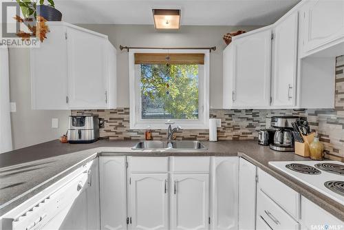 5823 Keffner Bay, Regina, SK - Indoor Photo Showing Kitchen With Double Sink