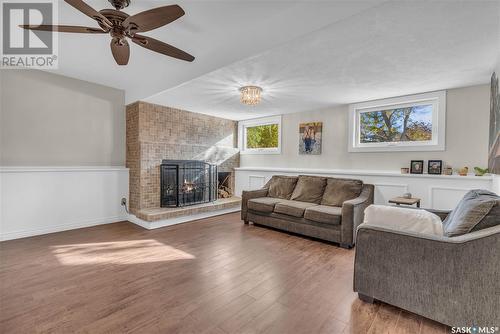 5823 Keffner Bay, Regina, SK - Indoor Photo Showing Living Room With Fireplace