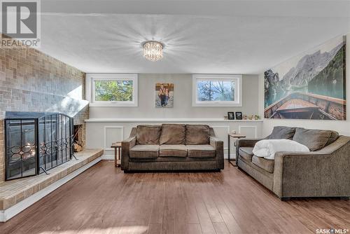 5823 Keffner Bay, Regina, SK - Indoor Photo Showing Living Room With Fireplace