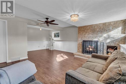 5823 Keffner Bay, Regina, SK - Indoor Photo Showing Living Room With Fireplace