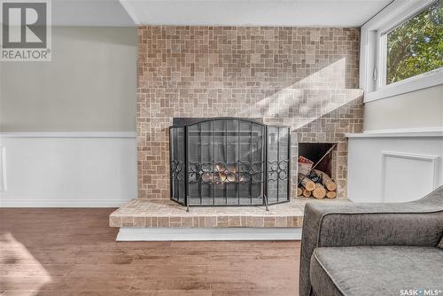 5823 Keffner Bay, Regina, SK - Indoor Photo Showing Other Room With Fireplace