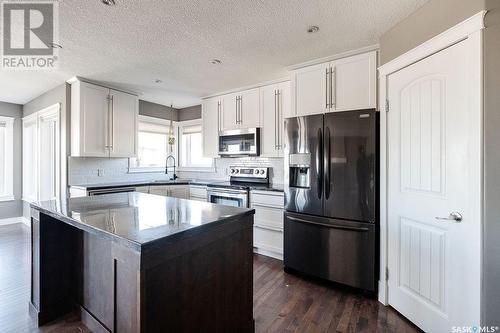 134 Herauf Street, Balgonie, SK - Indoor Photo Showing Kitchen With Upgraded Kitchen