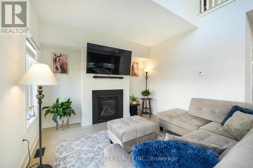 42 Ruby Crescent, Orillia, ON - Indoor Photo Showing Living Room With Fireplace