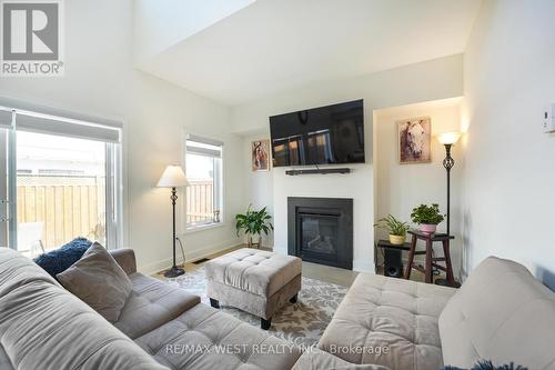 42 Ruby Crescent, Orillia, ON - Indoor Photo Showing Living Room With Fireplace