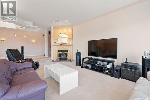 415 Braeside Bay, Saskatoon, SK - Indoor Photo Showing Living Room With Fireplace