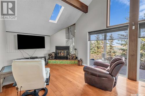 256 Woodland Avenue, Buena Vista, SK - Indoor Photo Showing Living Room With Fireplace