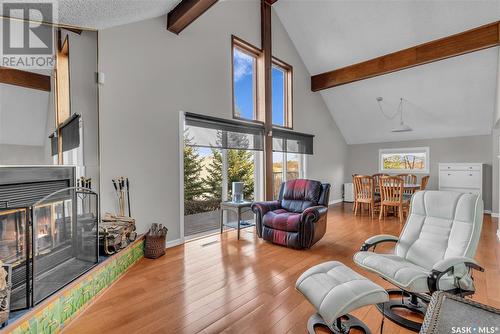 256 Woodland Avenue, Buena Vista, SK - Indoor Photo Showing Living Room With Fireplace