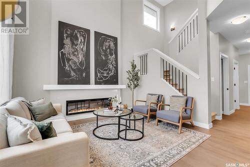 402 Aniskotaw Way, Saskatoon, SK - Indoor With Fireplace