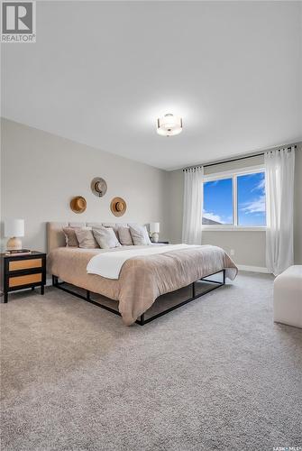 402 Aniskotaw Way, Saskatoon, SK - Indoor Photo Showing Bedroom