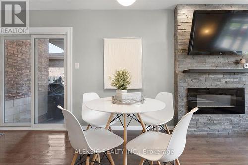 62 Greencedar Drive, Hamilton, ON - Indoor Photo Showing Dining Room With Fireplace