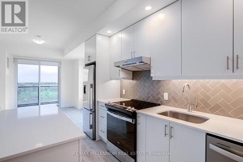 1004 - 3200 William Colton Avenue, Oakville, ON - Indoor Photo Showing Kitchen With Upgraded Kitchen