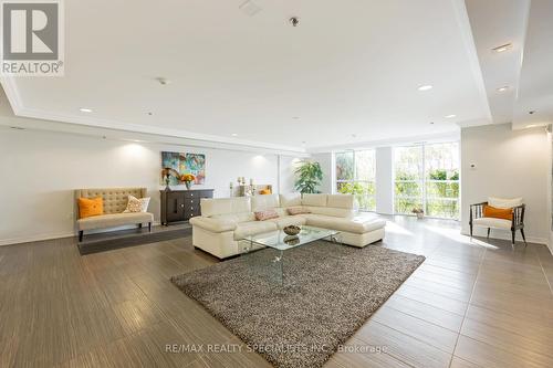 406 - 1419 Costigan Road, Milton, ON - Indoor Photo Showing Living Room