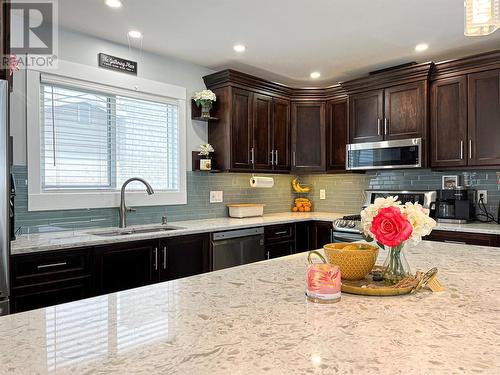 102 Mcgraw Court, Penticton, BC - Indoor Photo Showing Kitchen With Double Sink With Upgraded Kitchen