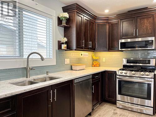 102 Mcgraw Court, Penticton, BC - Indoor Photo Showing Kitchen With Double Sink With Upgraded Kitchen