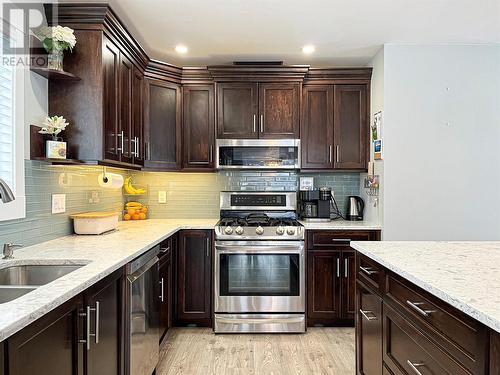 102 Mcgraw Court, Penticton, BC - Indoor Photo Showing Kitchen With Double Sink