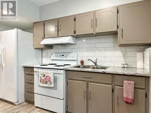 102 Mcgraw Court, Penticton, BC - Indoor Photo Showing Kitchen With Double Sink