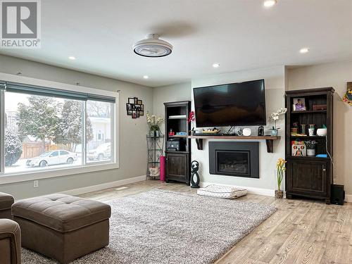 102 Mcgraw Court, Penticton, BC - Indoor Photo Showing Living Room With Fireplace