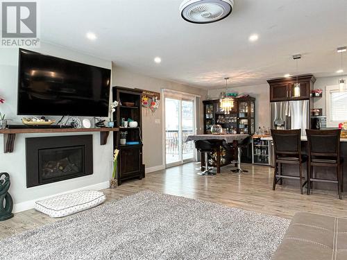 102 Mcgraw Court, Penticton, BC - Indoor Photo Showing Living Room With Fireplace