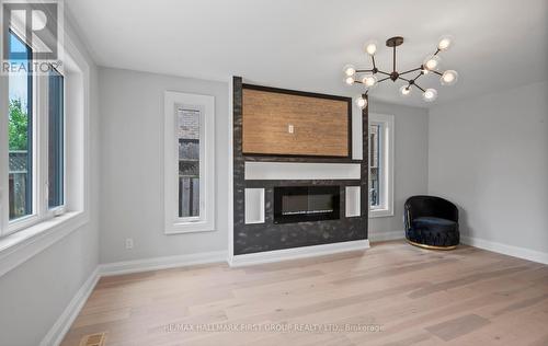 12 Glenayr Gate, Whitby, ON - Indoor Photo Showing Living Room With Fireplace