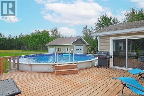 940 Pleasant Drive, Minto, NB - Outdoor With Above Ground Pool With Deck Patio Veranda With Exterior