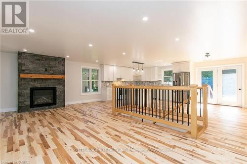 318743 Grey Road 1 Road, Georgian Bluffs, ON - Indoor Photo Showing Living Room With Fireplace