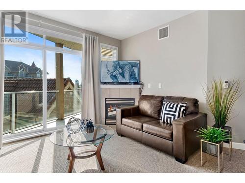 1088 Sunset Drive Unit# 409, Kelowna, BC - Indoor With Fireplace