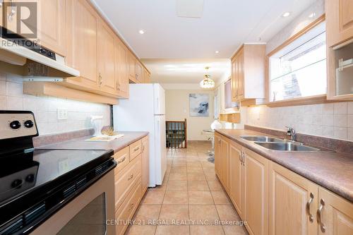 28 Wichey Road, Toronto, ON - Indoor Photo Showing Kitchen With Double Sink