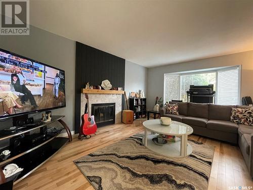 2703 18Th Street W, Saskatoon, SK - Indoor Photo Showing Living Room With Fireplace