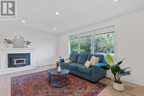 10759 Sunset Road, Southwold (Talbotville), ON - Indoor Photo Showing Living Room With Fireplace