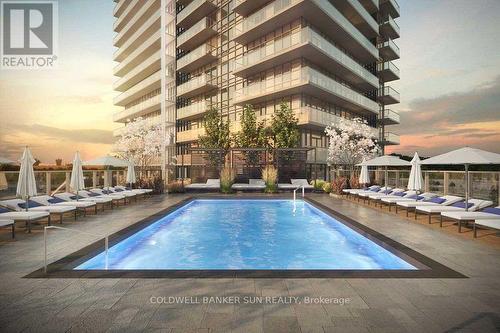 705 - 4675 Metcalfe Avenue, Mississauga, ON - Outdoor With In Ground Pool