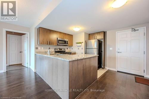 413 - 50 Bryan Court, Kitchener, ON - Indoor Photo Showing Kitchen