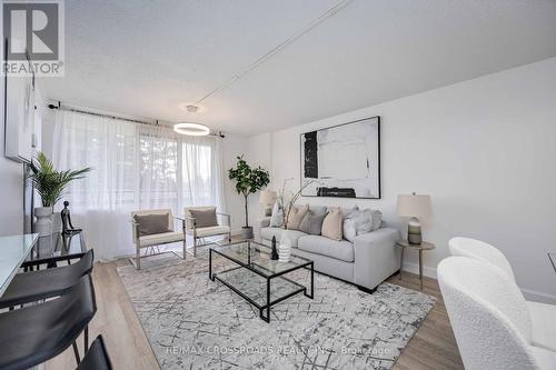 209 - 10 Markbrook Lane, Toronto, ON - Indoor Photo Showing Living Room