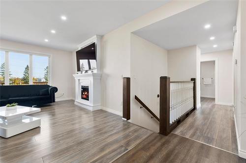 1 Arthur Fiola Place, Ste Anne, MB - Indoor Photo Showing Living Room With Fireplace