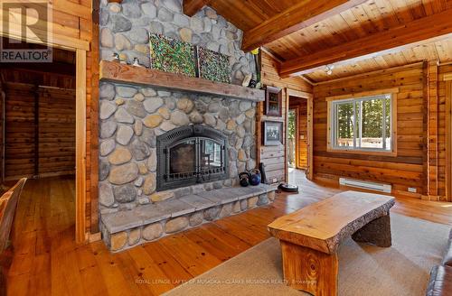 215 Crane Lake Way, The Archipelago, ON - Indoor Photo Showing Living Room With Fireplace