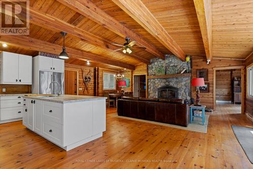 215 Crane Lake Way, The Archipelago, ON - Indoor Photo Showing Kitchen With Fireplace