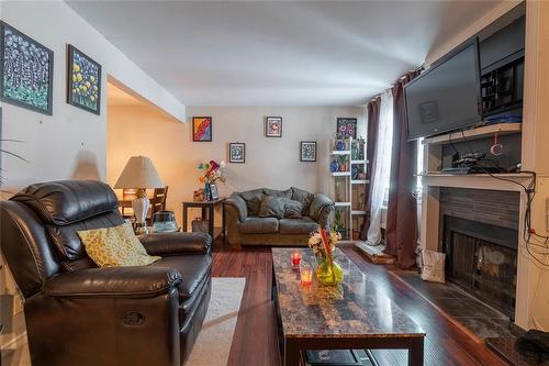 910 1742 St Mary'S Road, Winnipeg, MB - Indoor Photo Showing Living Room With Fireplace