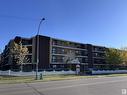 #103 10511 19 Av Nw, Edmonton, AB  - Outdoor With Facade 