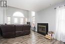 D-17 - 1663 Nash Road, Clarington, ON  - Indoor Photo Showing Living Room With Fireplace 