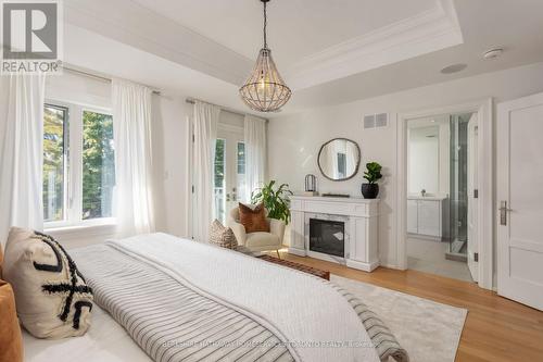 62 Clissold Road, Toronto, ON - Indoor Photo Showing Bedroom With Fireplace