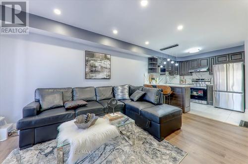 435 - 5225 Finch Avenue E, Toronto, ON - Indoor Photo Showing Living Room