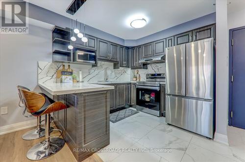 435 - 5225 Finch Avenue E, Toronto, ON - Indoor Photo Showing Kitchen With Stainless Steel Kitchen