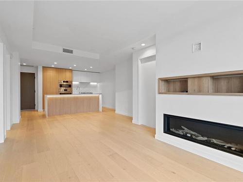 712-2000 Hannington Rd, Langford, BC - Indoor Photo Showing Living Room With Fireplace