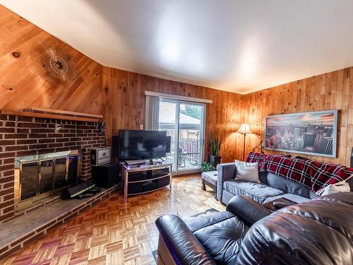 Living room - 6770 Av. Tisserand, Brossard, QC - Indoor Photo Showing Living Room With Fireplace