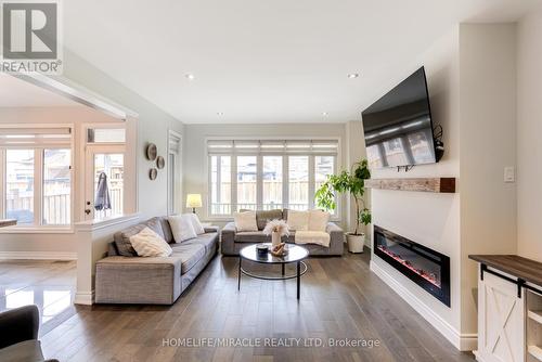 54 Hoard Avenue, New Tecumseth, ON - Indoor Photo Showing Living Room With Fireplace