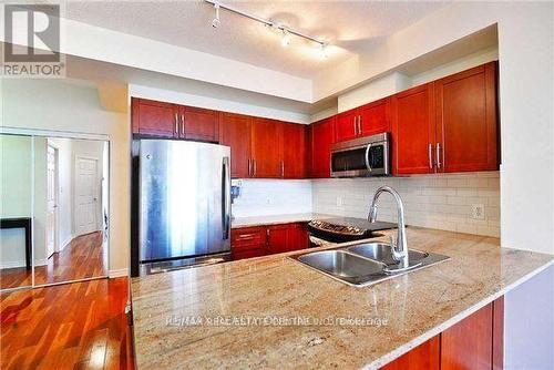 2101 - 3504 Hurontario Street, Mississauga, ON - Indoor Photo Showing Kitchen With Double Sink